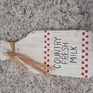 Homemade wooden milk sign.